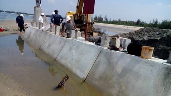 Xây dựng đè chắn để chống xói mòn